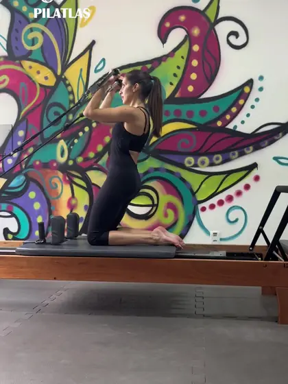 Kneeling arm exercise on the Reformer